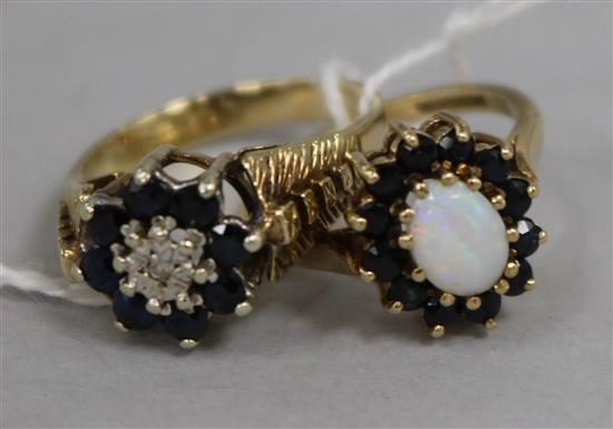 An opal and sapphire cluster ring and an illusion-set diamond and sapphire cluster ring, 9ct gold settings.